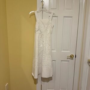 NWT White Sleeveless Dress with Embroidered Design